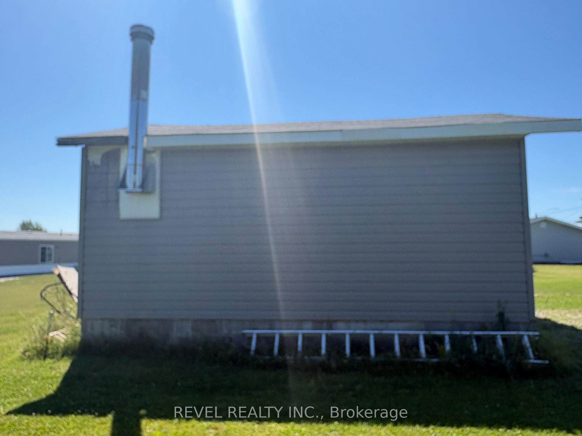 Photo 25 of 364 Genier Road, Cochrane — HOMEH