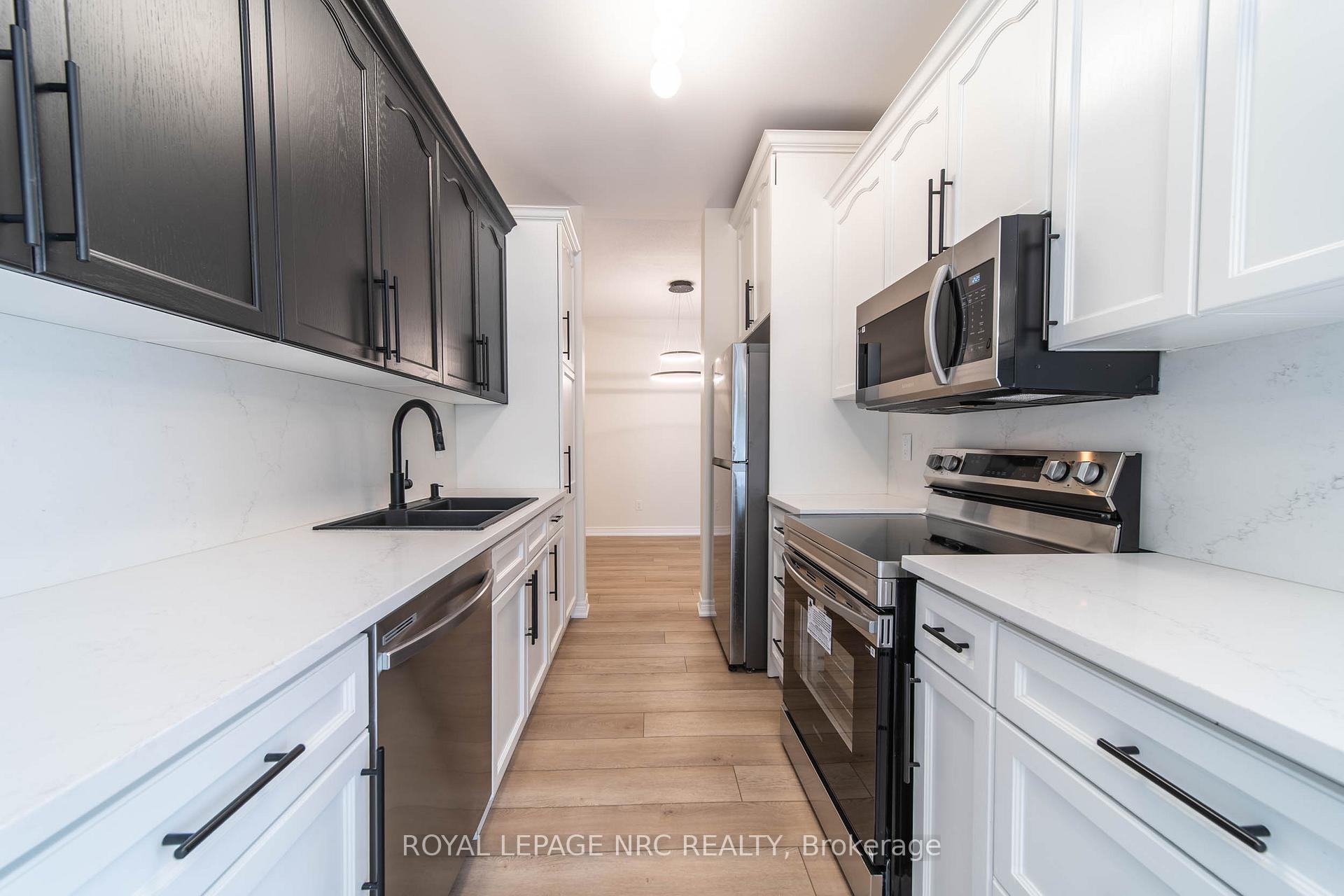 Photo 11 of Unit 3, 5200 Dorchester Road, Niagara Falls, Morrison — HOMEH