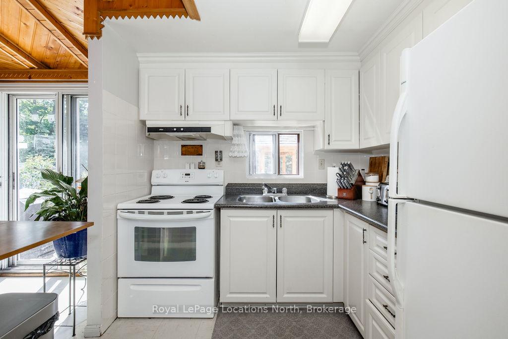 Photo 11 of 77 Laidlaw Street, Wasaga Beach — HOMEH