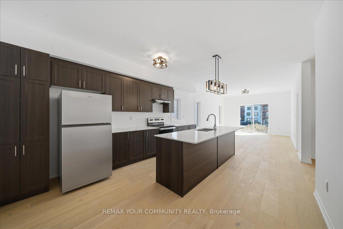 Photo 3 of 26 Flan Boulevard, Barrie, Rural Barrie Southeast — HOMEH