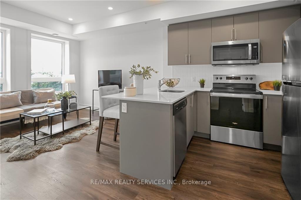 Photo 11 of Unit 313, 26 Lowes Road, Guelph, Clairfields/Hanlon Business Park — HOMEH
