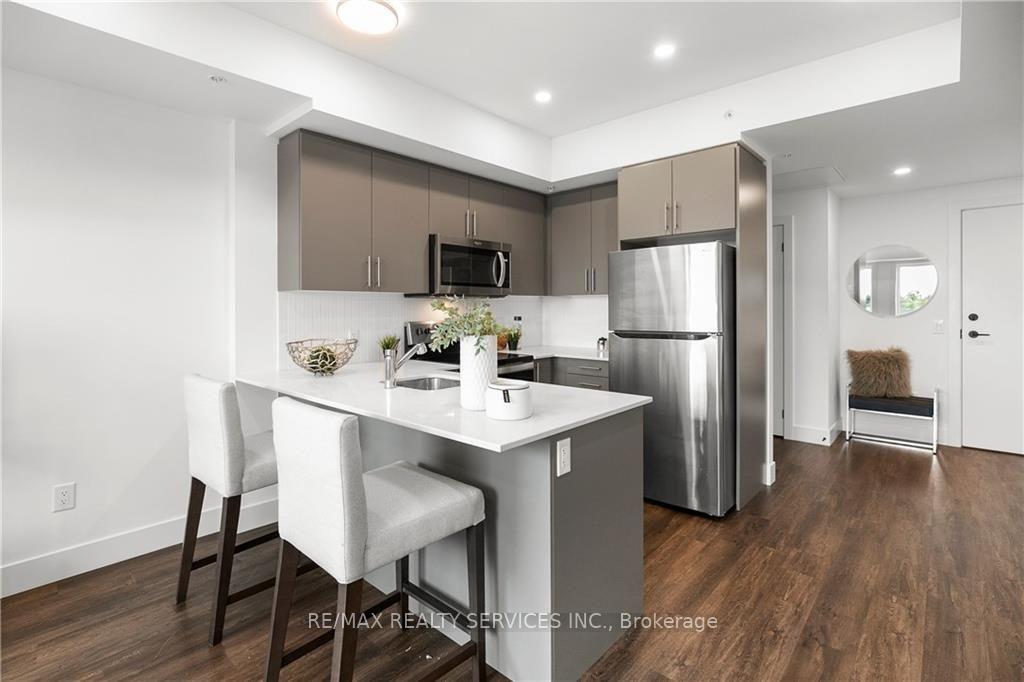 Photo 13 of Unit 313, 26 Lowes Road, Guelph, Clairfields/Hanlon Business Park — HOMEH