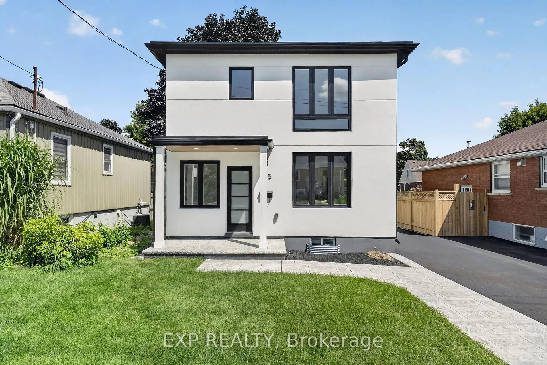 Front of 325 Queensdale Avenue E