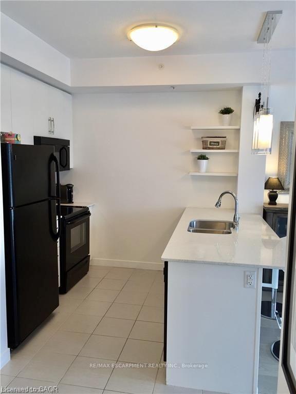 Photo 2 of Unit 206, 5010 Corporate Drive, Burlington, Uptown — HOMEH