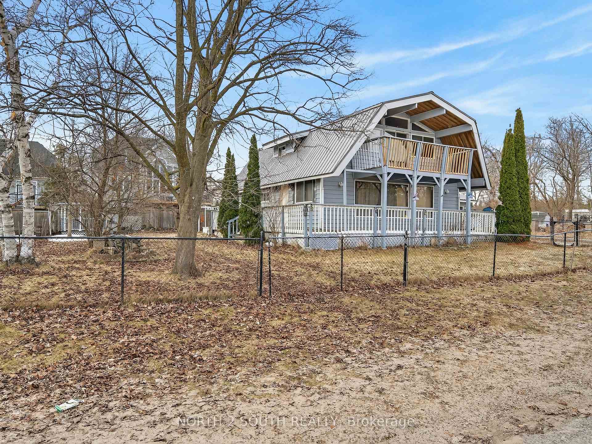 Photo 3 of 13 Bayview Avenue, Wasaga Beach — HOMEH