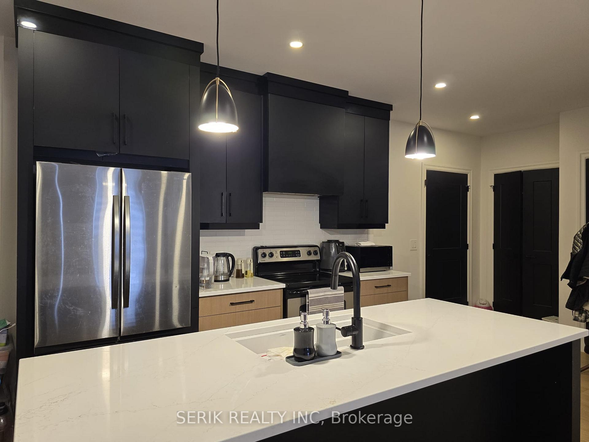 Photo 3 of Main -7520 Splendour Drive, Niagara Falls, Brown — HOMEH