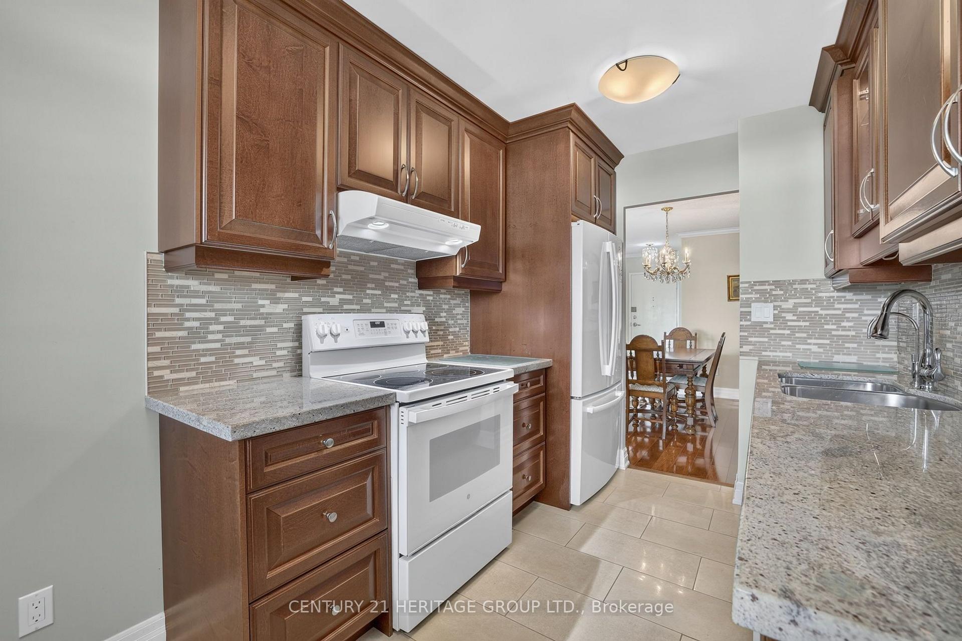 Photo 19 of Unit 603, 7811 Yonge Street, Markham, Thornhill — HOMEH