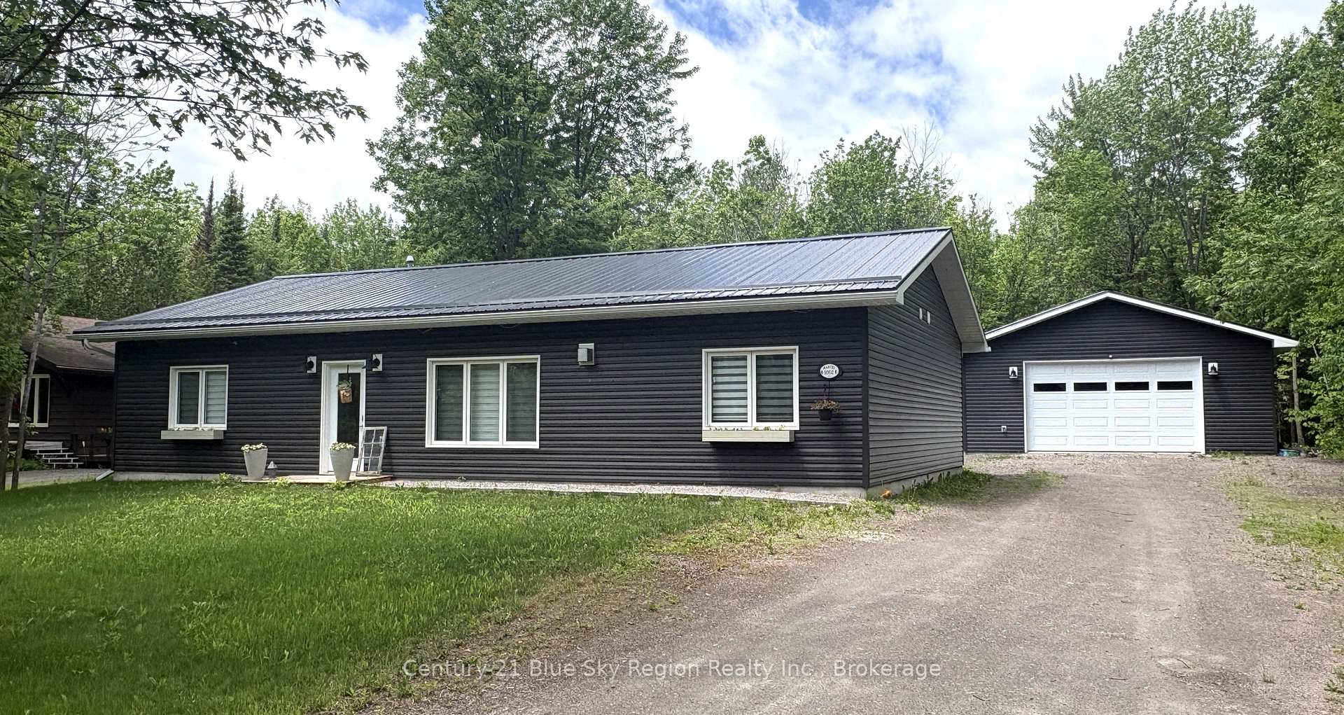 Front of 1662 Jocko Point Rd W