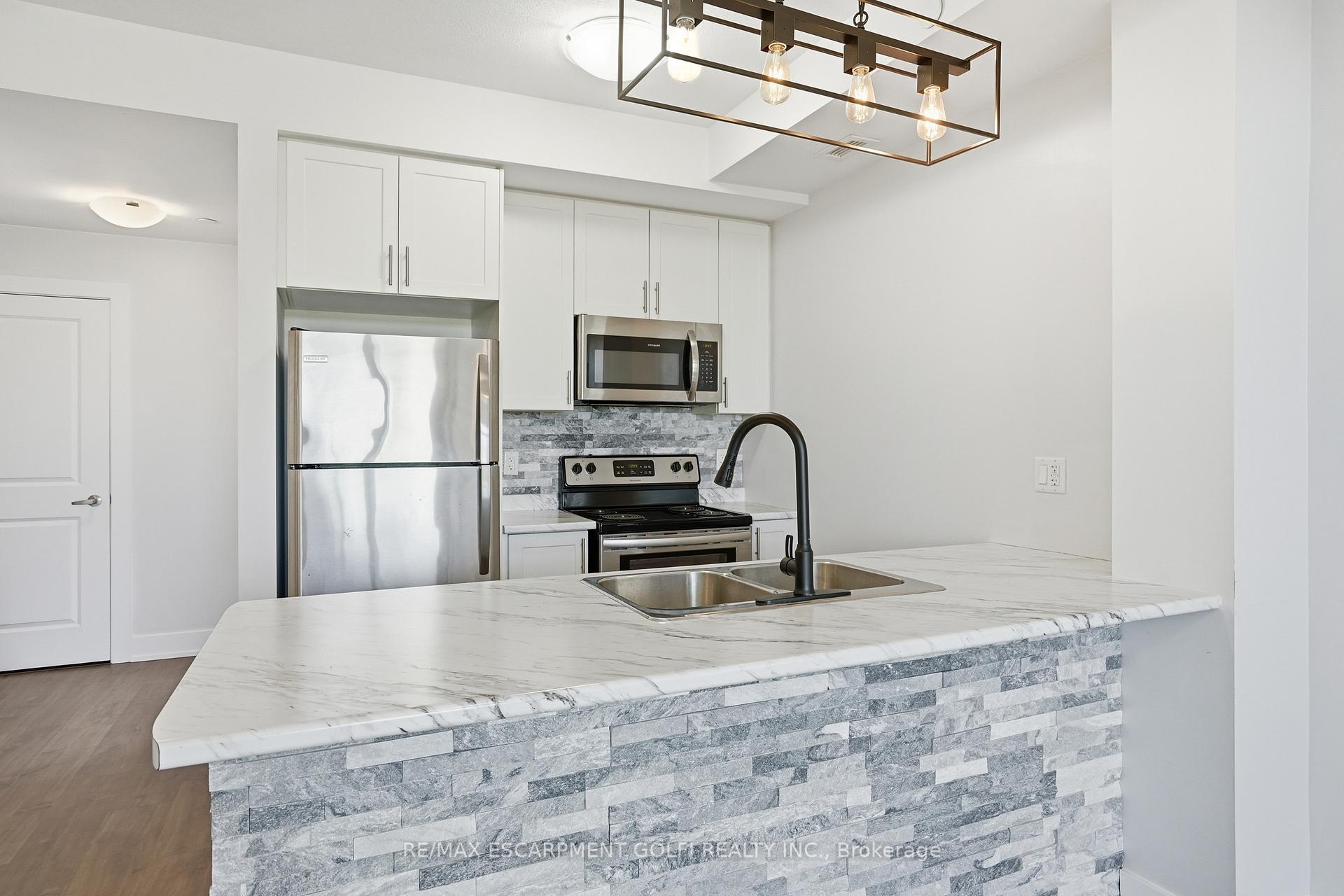 Photo 5 of Unit 129, 101 Shoreview Place, Hamilton, Lakeshore — HOMEH