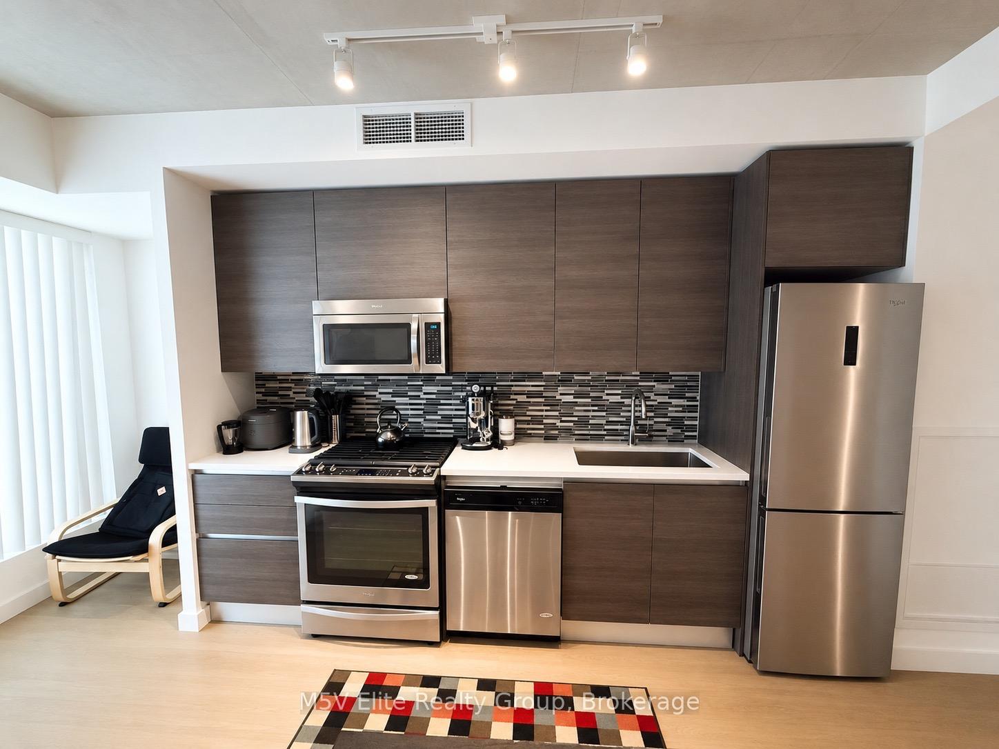 Photo 4 of Unit 426, 111 Bathurst Street, Toronto, Waterfront Communities — HOMEH