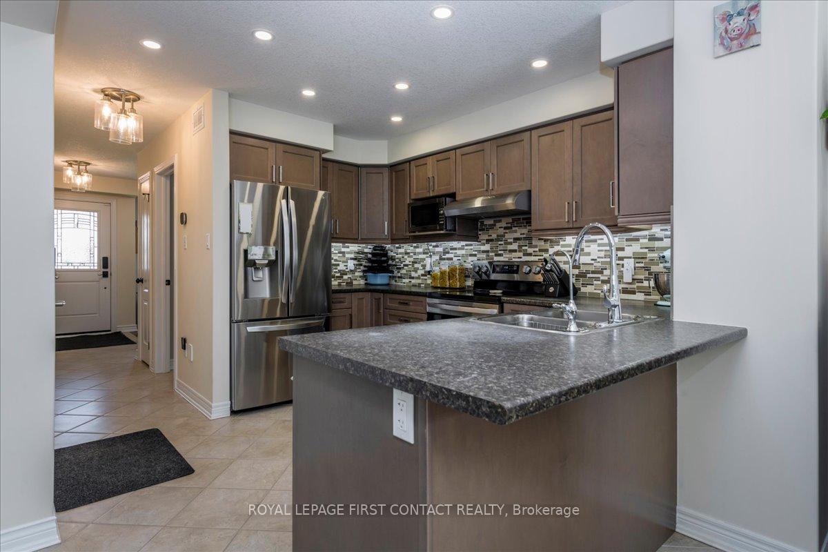 Photo 5 of 182 Banting Crescent, Essa, Angus — HOMEH
