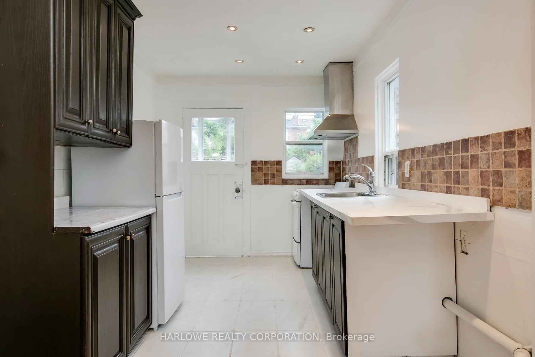 Photo 14 of 61 Castleton Avenue, Toronto, Rockcliffe-Smythe — HOMEH