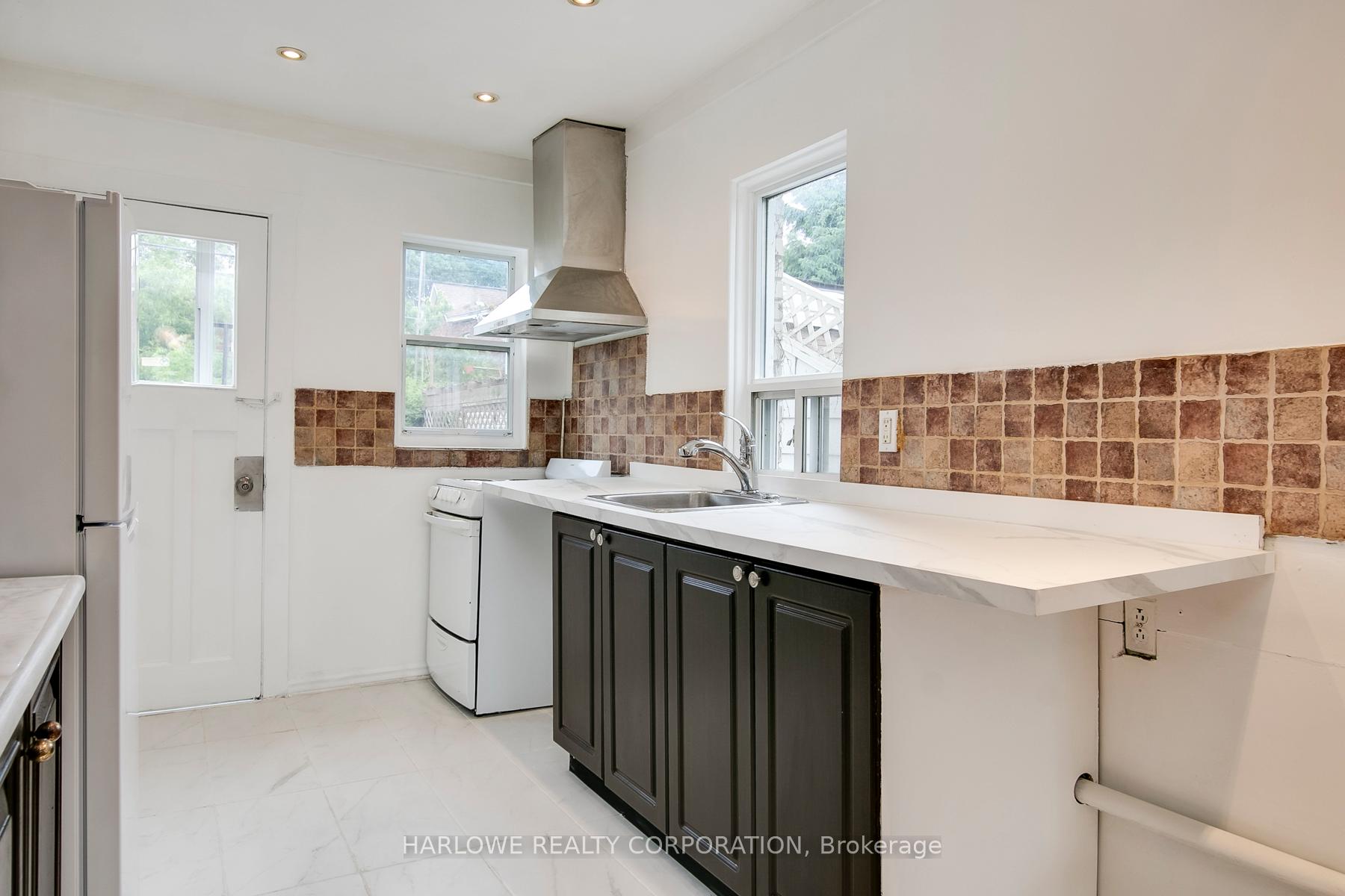 Photo 15 of 61 Castleton Avenue, Toronto, Rockcliffe-Smythe — HOMEH