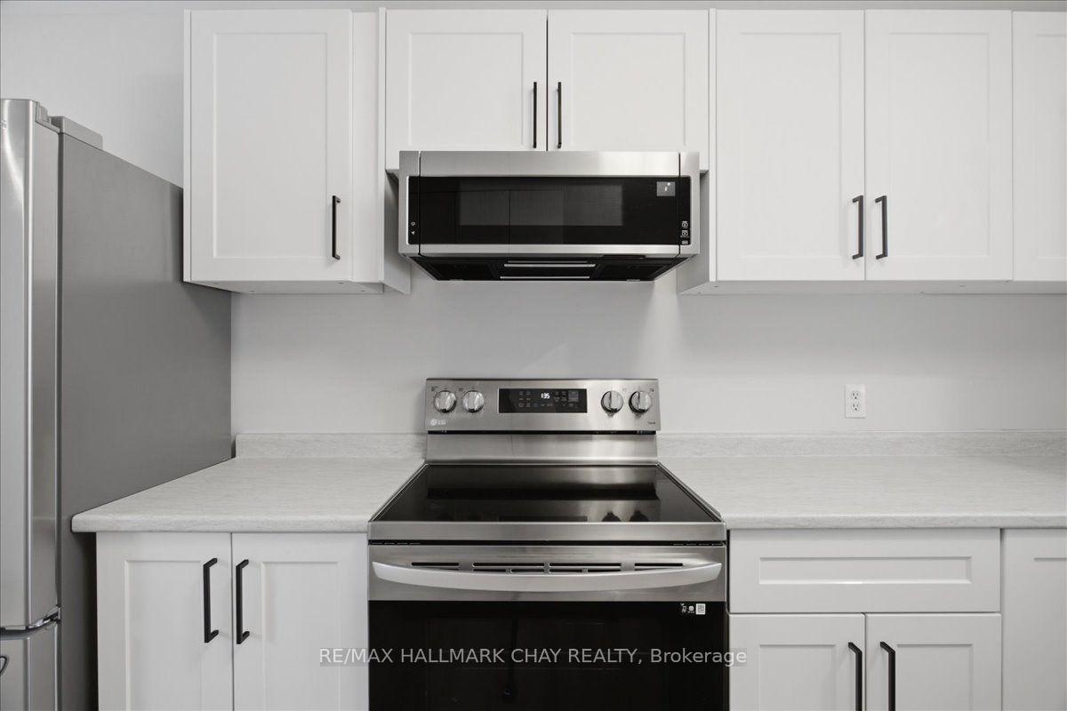 Photo 17 of Unit 3, 15 Parkside Drive, Barrie, Queen's Park — HOMEH