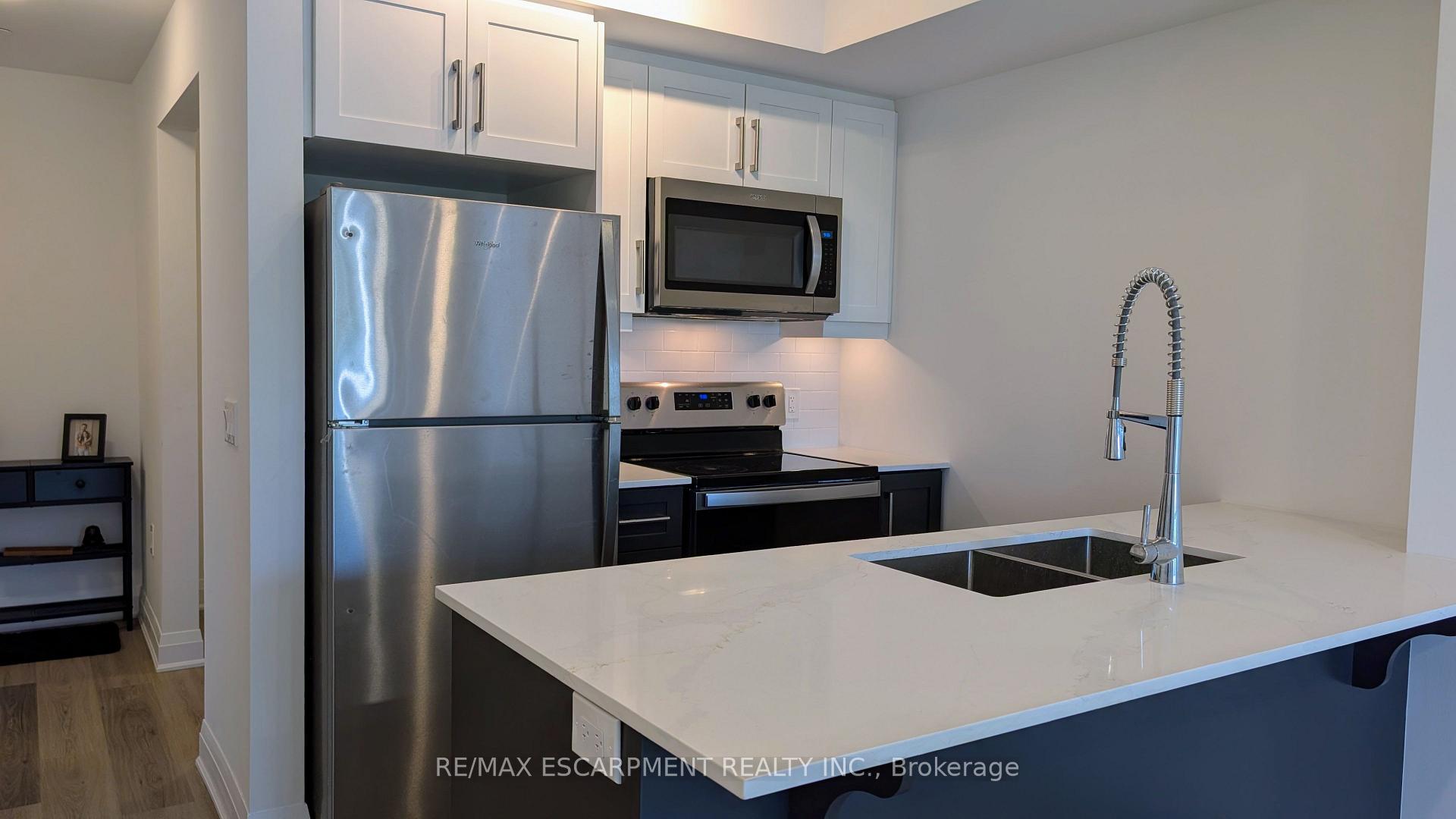 Photo 21 of Unit 309, 1936 Rymal Road E, Hamilton, Rural Glanbrook — HOMEH