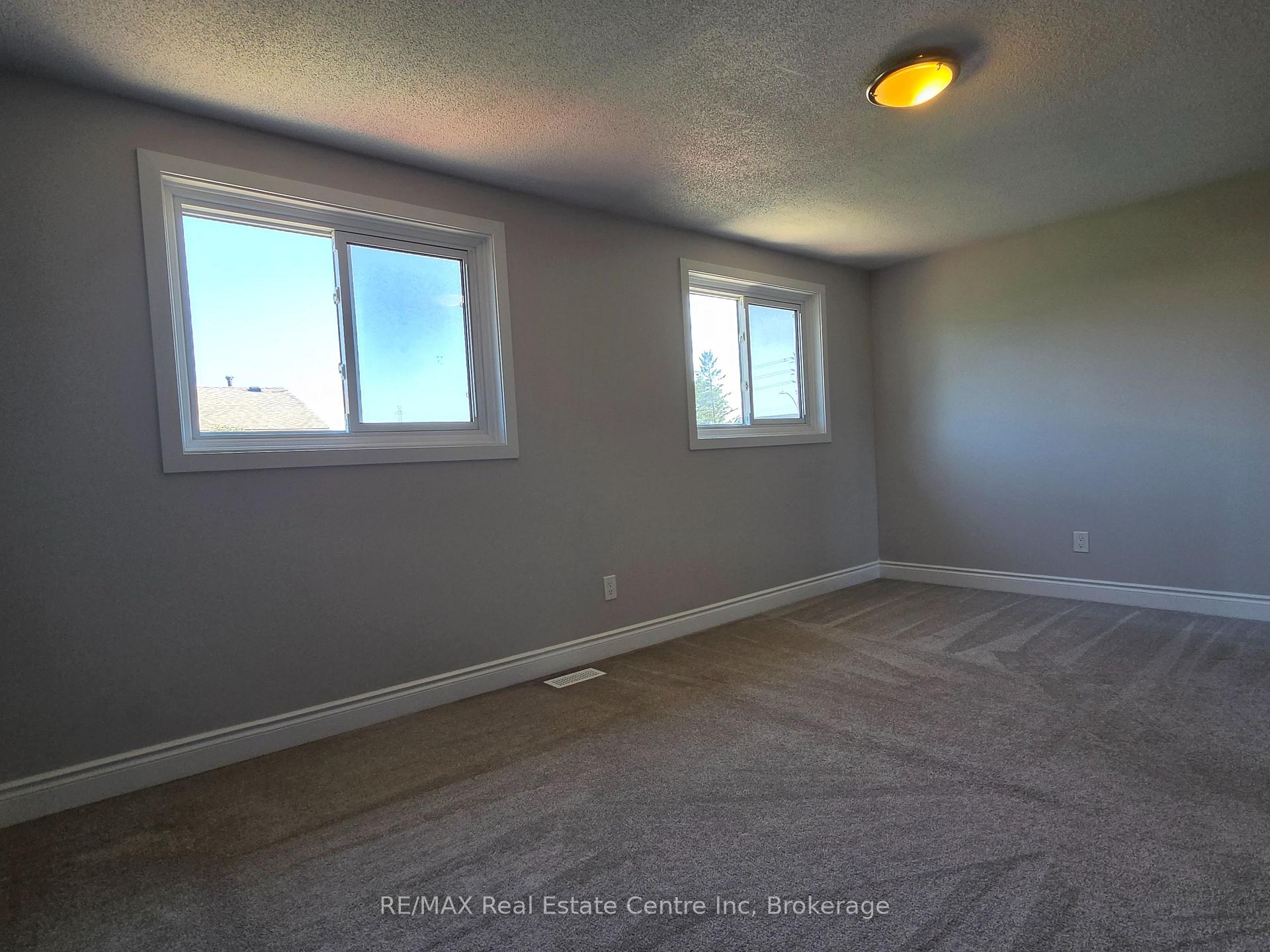 Photo 12 of Unit 101, 31 Greengate Rd, Guelph, Junction/Onward Willow — HOMEH