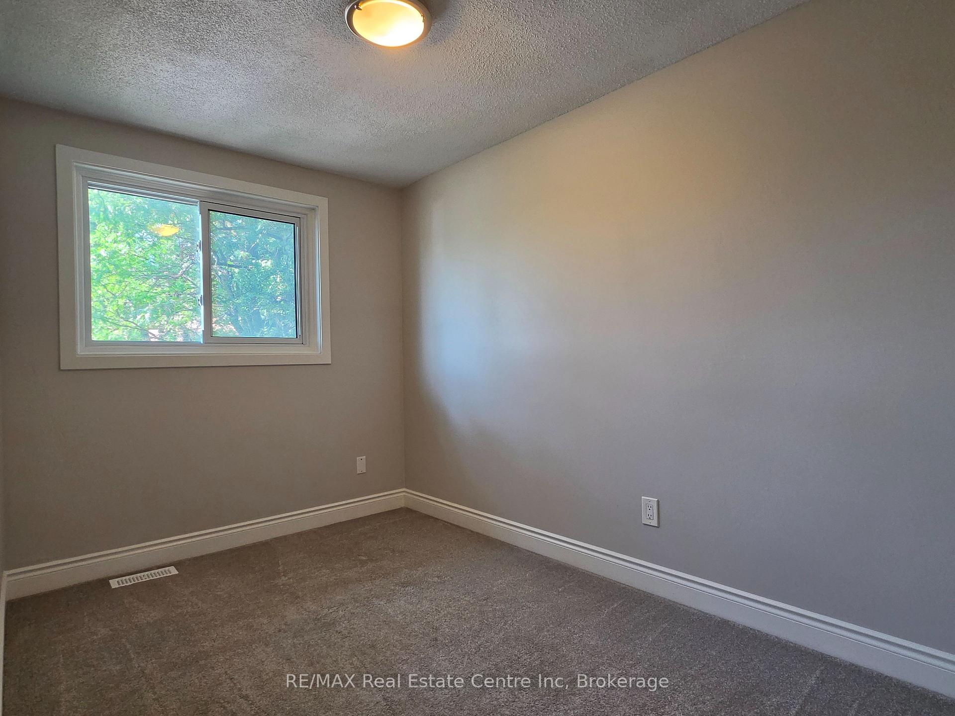 Photo 14 of Unit 101, 31 Greengate Rd, Guelph, Junction/Onward Willow — HOMEH