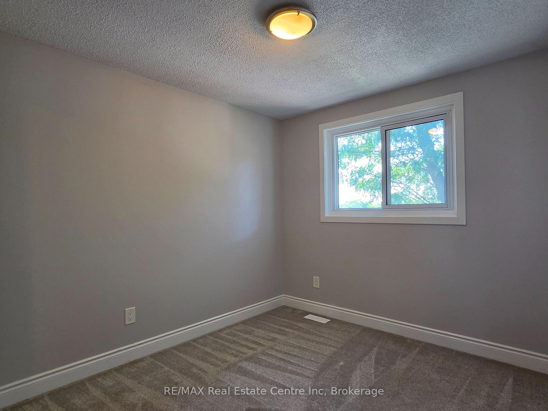 Photo 15 of Unit 101, 31 Greengate Rd, Guelph, Junction/Onward Willow — HOMEH