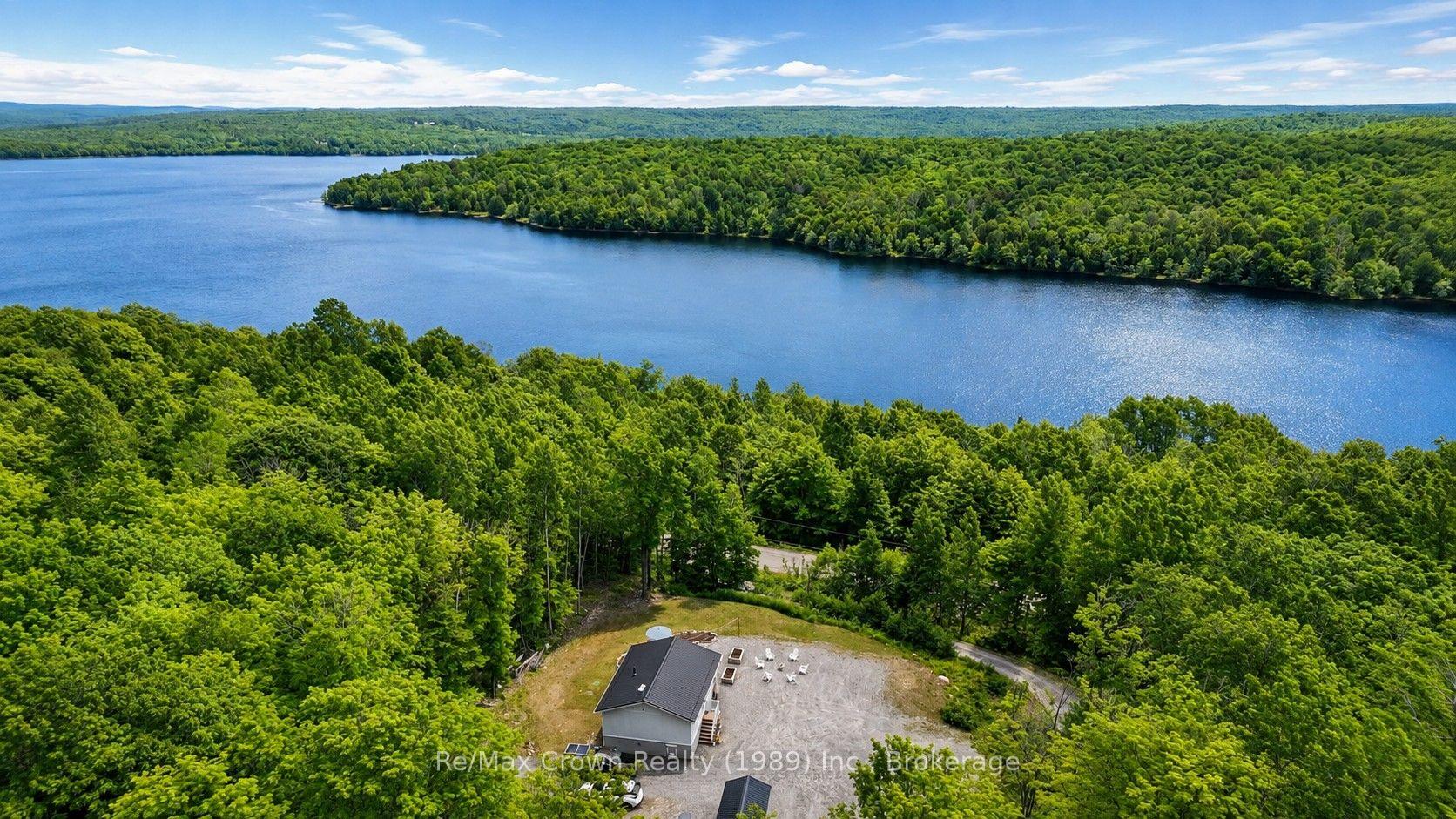 Photo 1 of 1052 Limberlost Point Road, Parry Sound Remote Area, Restoule — HOMEH