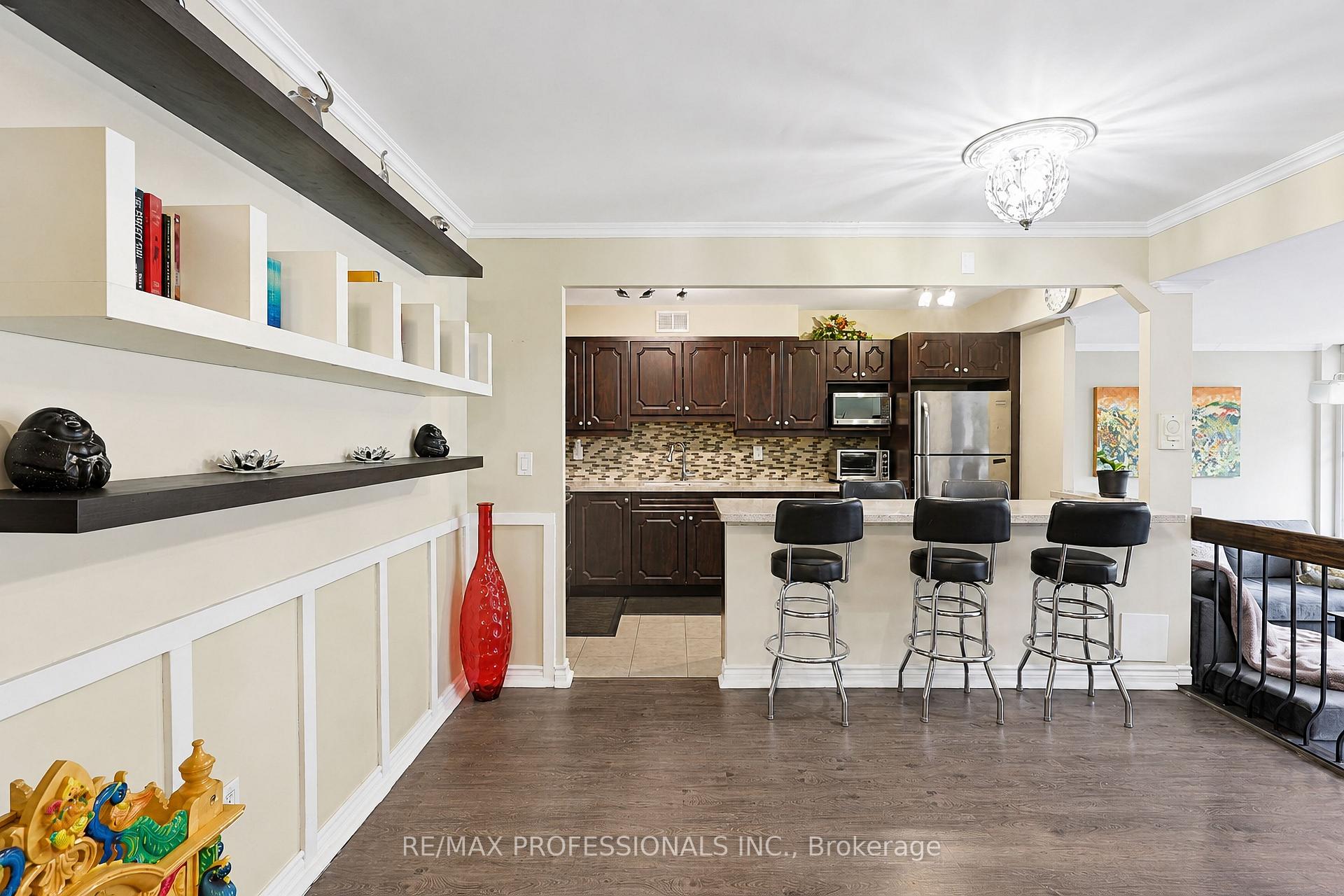 Photo 5 of Unit 209, 31 Four Winds Drive, North York, York University Heights — HOMEH