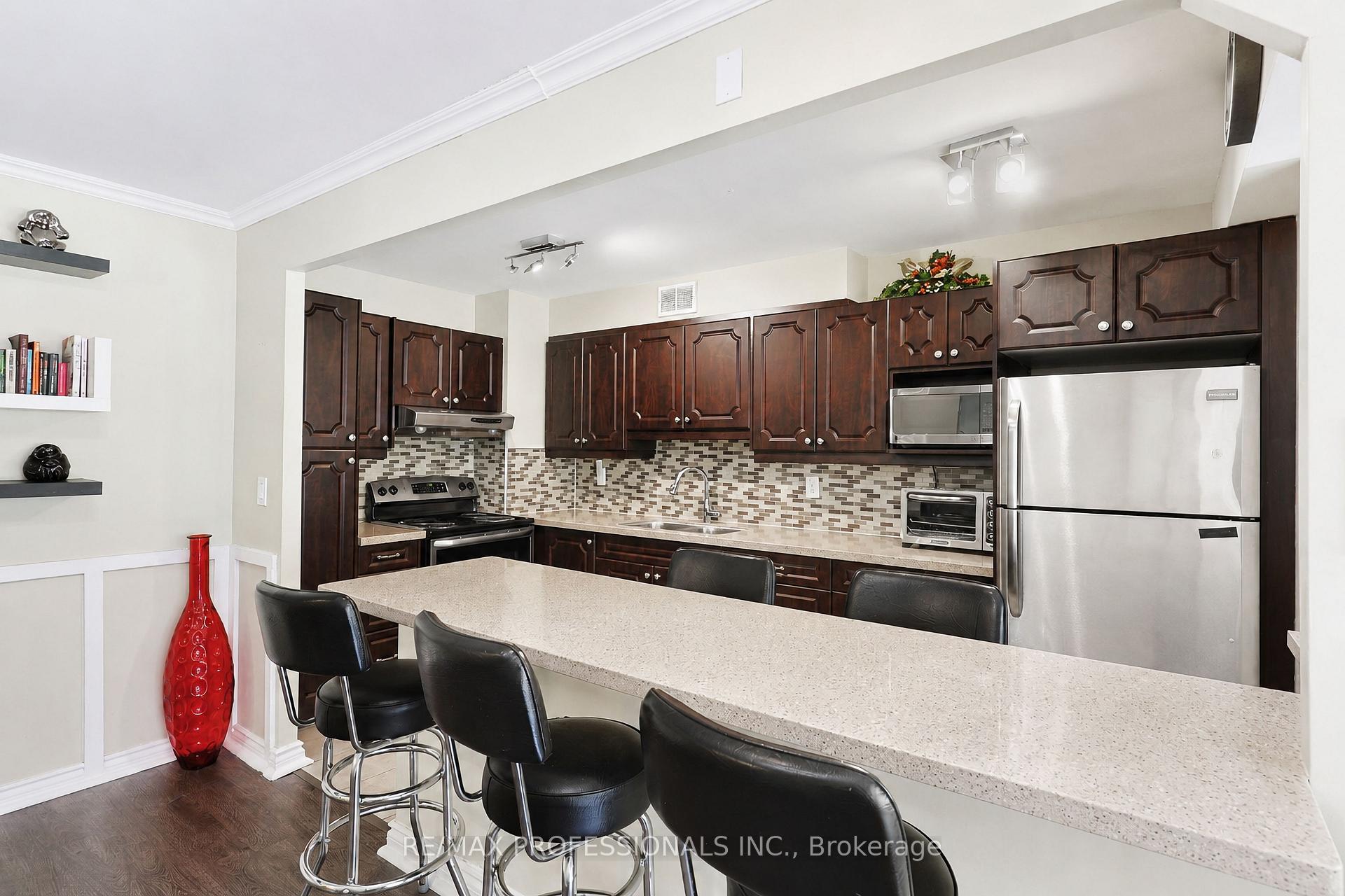 Photo 8 of Unit 209, 31 Four Winds Drive, North York, York University Heights — HOMEH