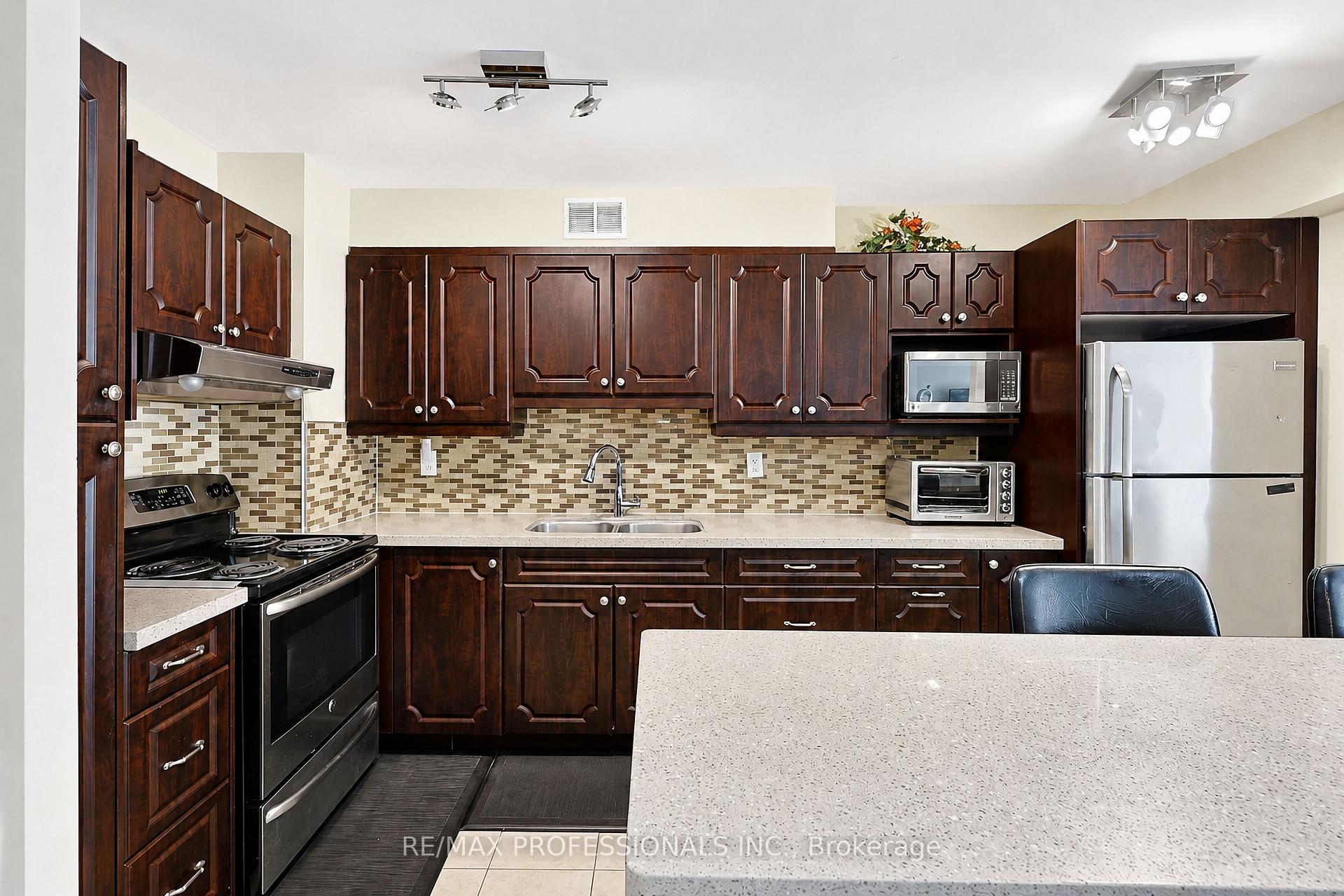 Photo 9 of Unit 209, 31 Four Winds Drive, North York, York University Heights — HOMEH