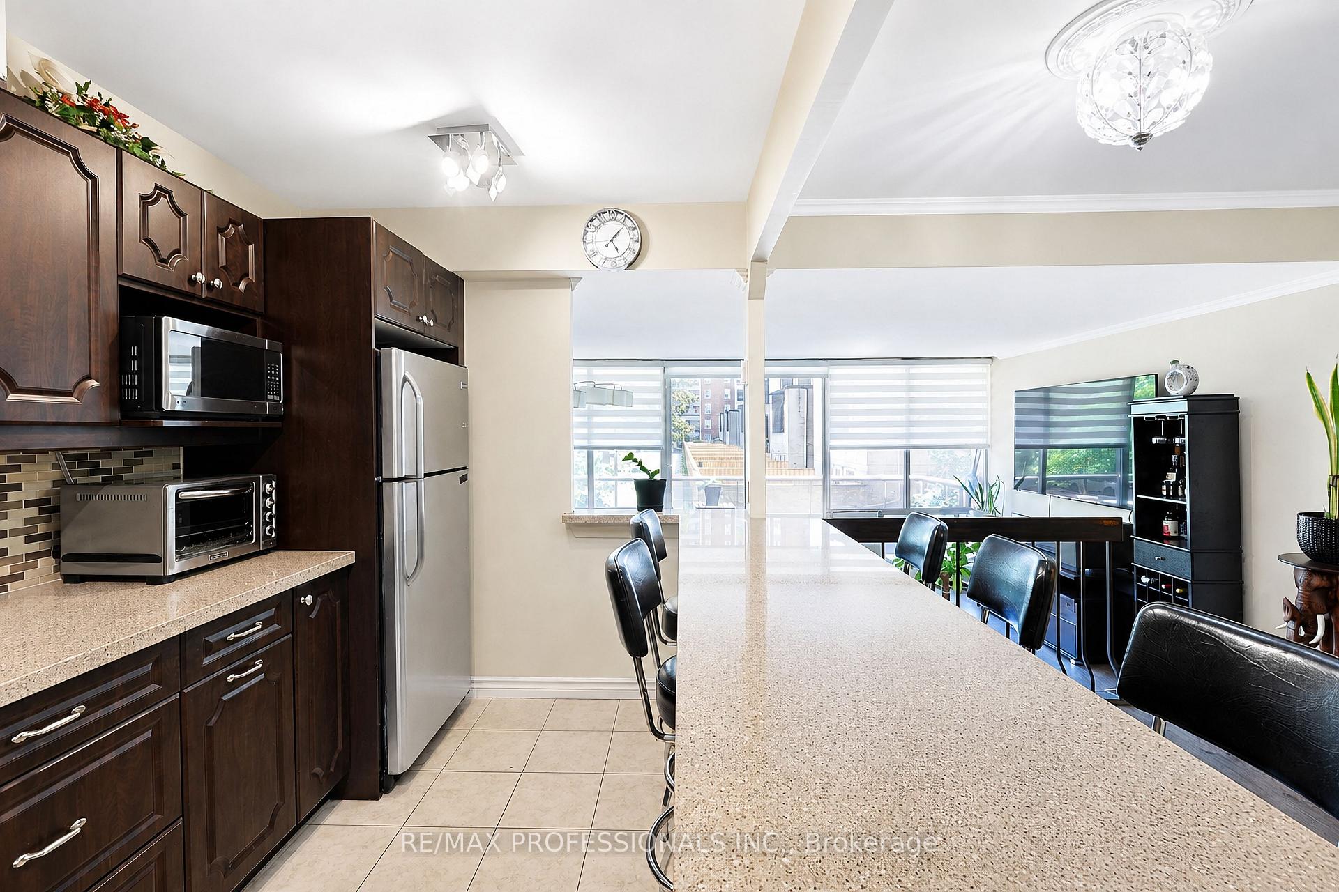 Photo 10 of Unit 209, 31 Four Winds Drive, North York, York University Heights — HOMEH