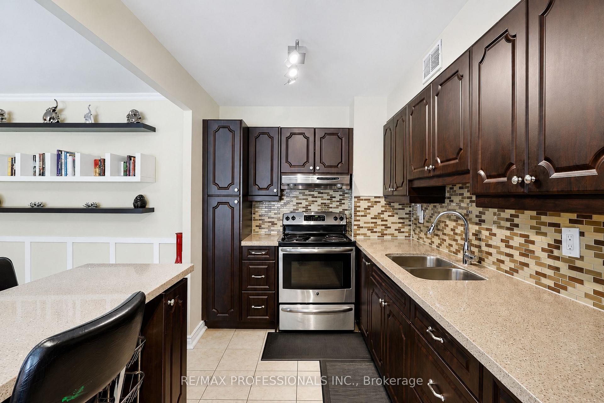 Photo 11 of Unit 209, 31 Four Winds Drive, North York, York University Heights — HOMEH