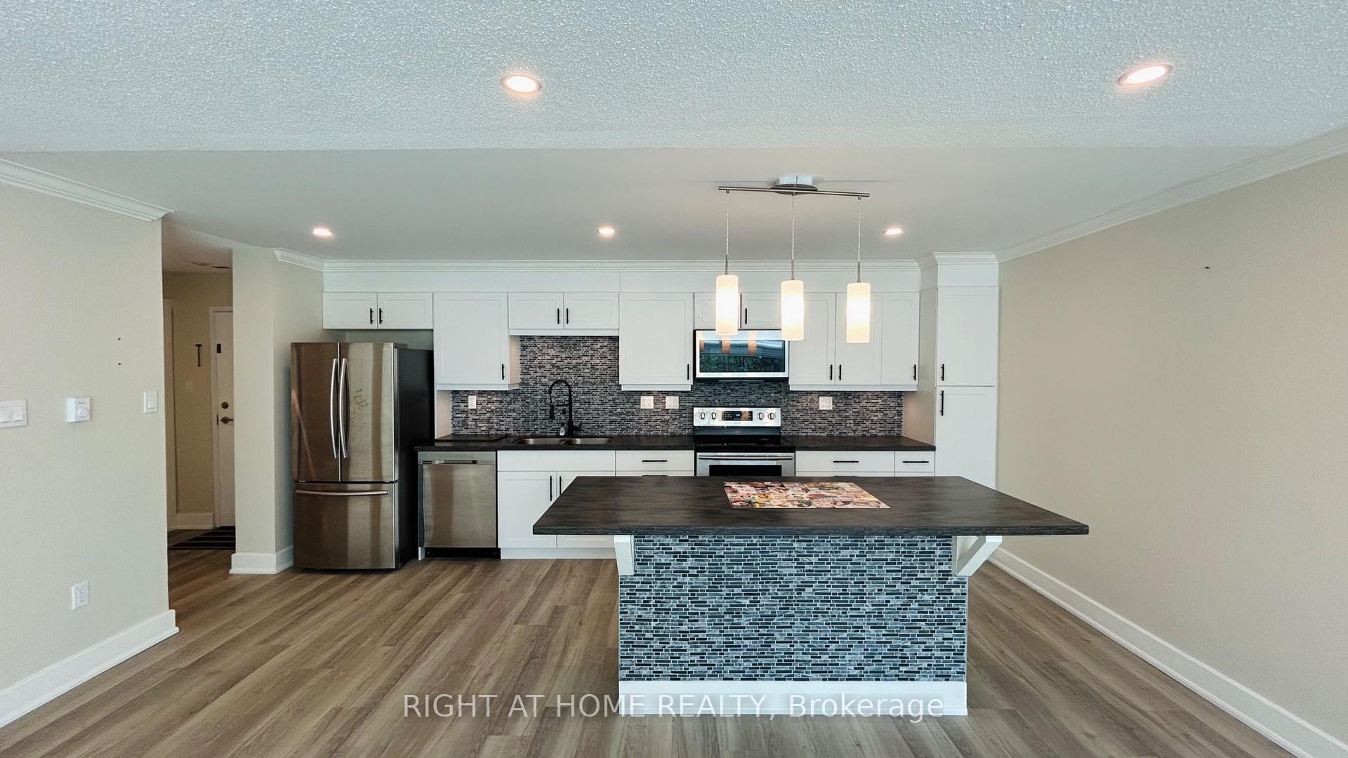 Photo 6 of Unit 103, 45 Pond Mills Road, London, South J — HOMEH
