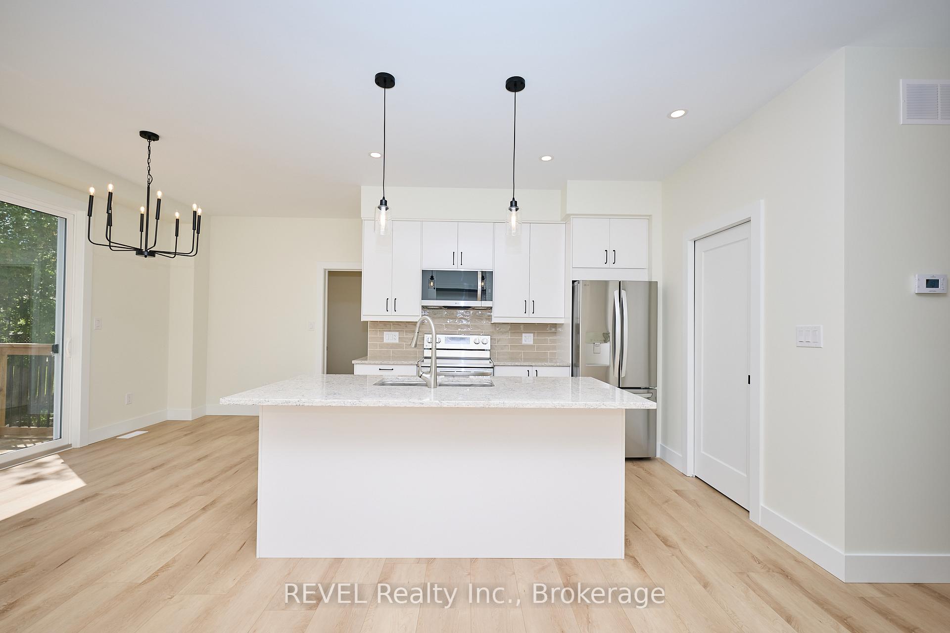 Photo 7 of Unit Upper Unit, 4650 Belfast Avenue, Niagara Falls, Ascot — HOMEH