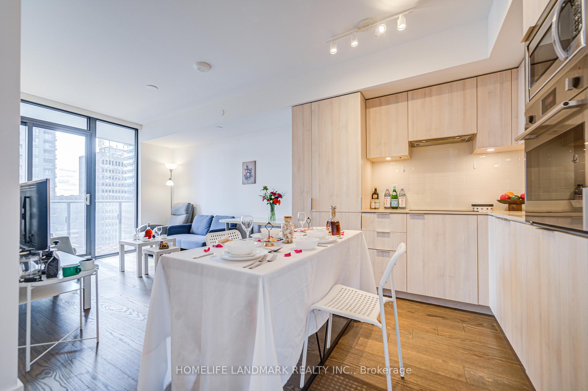 Photo 6 of Unit 1106, 11 Wellesley Street W, Toronto, Bay Street Corridor — HOMEH