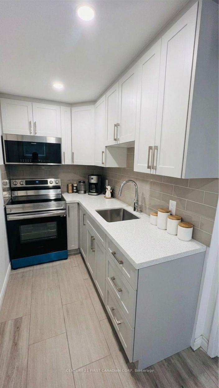 Photo 7 of Unit Lower Unit, 1875 Reilly Walk, London, North D — HOMEH