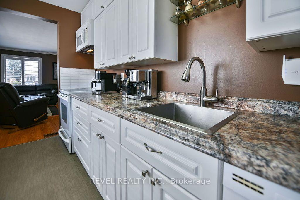Photo 8 of 511 Pine Street N, Timmins, TNE - North — HOMEH