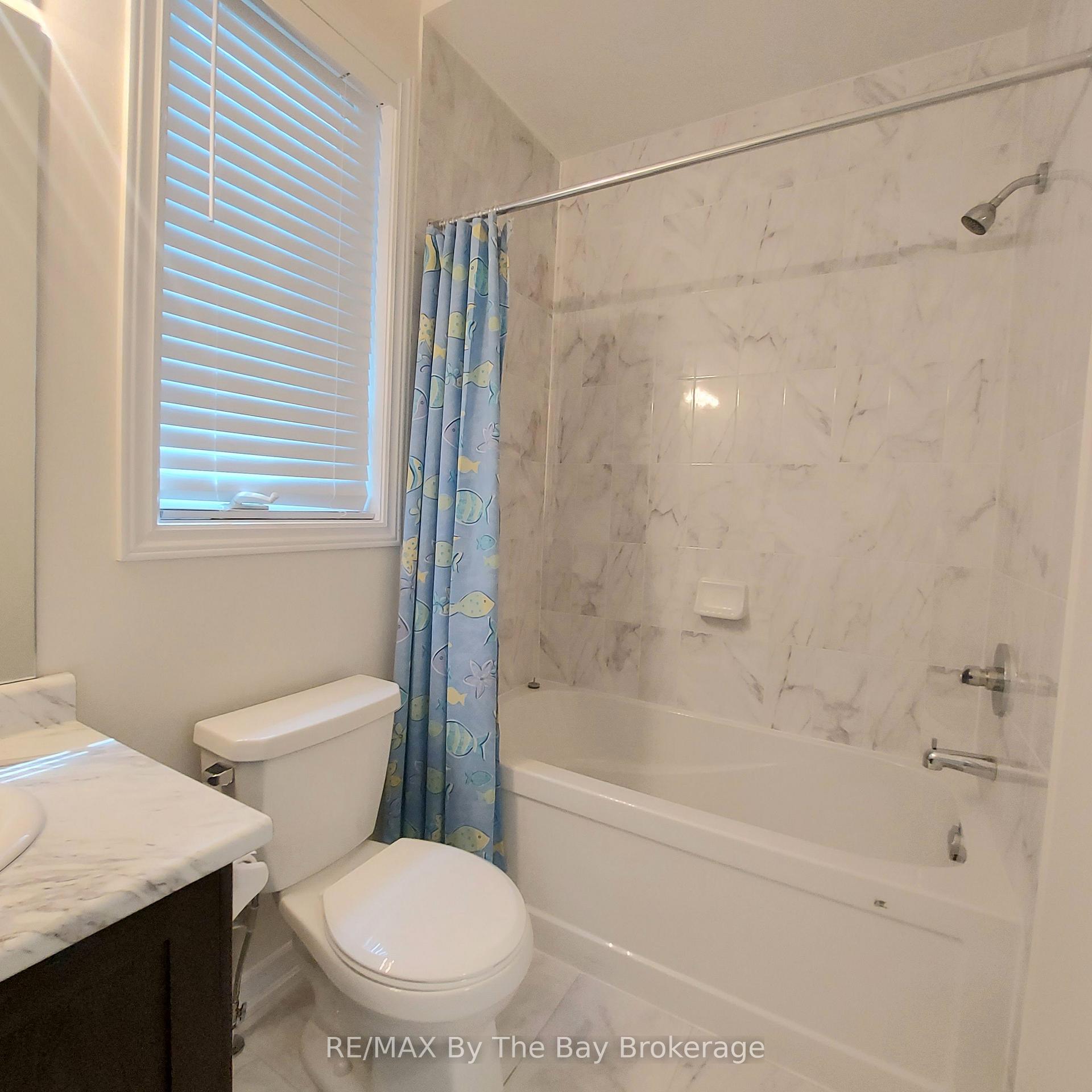Photo 7 of Unit UPPER, 92 Berkely Street, Wasaga Beach — HOMEH