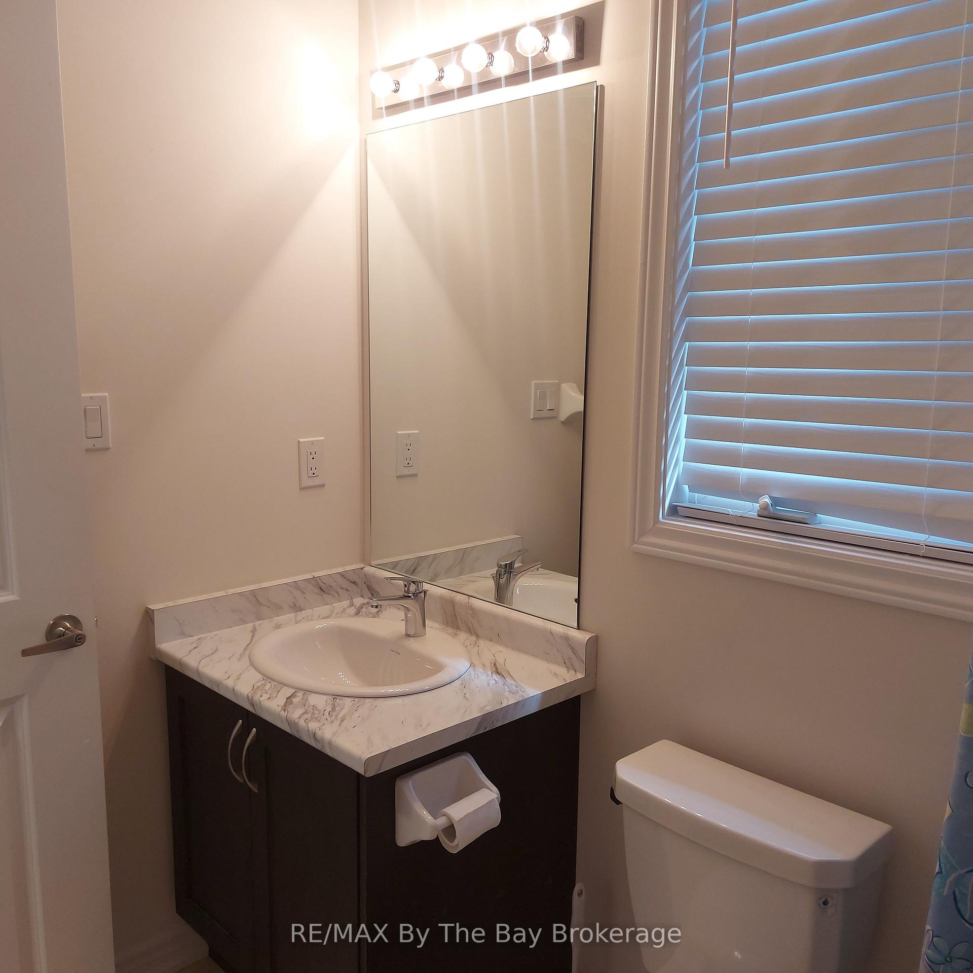 Photo 9 of Unit UPPER, 92 Berkely Street, Wasaga Beach — HOMEH