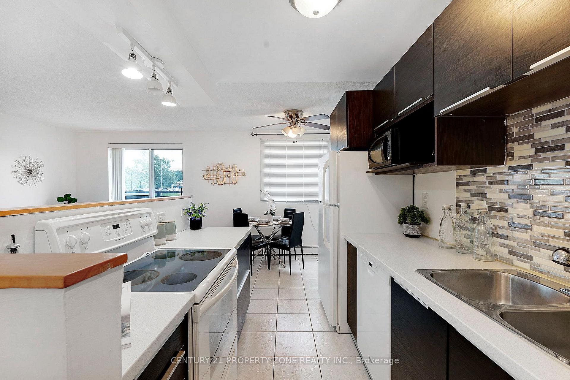 Photo 12 of Unit 105, 851 Queenston Road, Hamilton, Stoney Creek — HOMEH