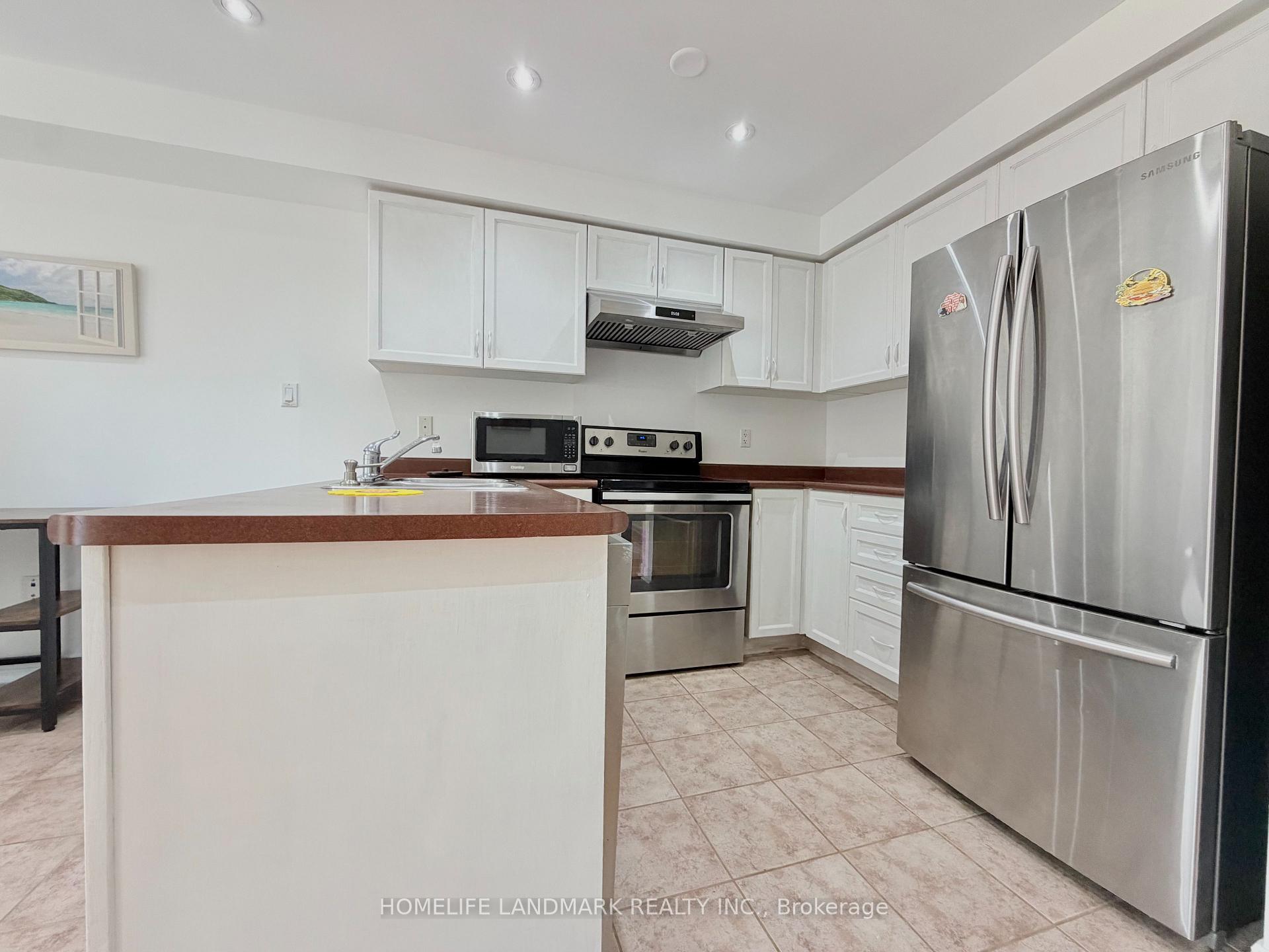 Photo 3 of 1967 Bur Oak Avenue, Markham, Greensborough — HOMEH