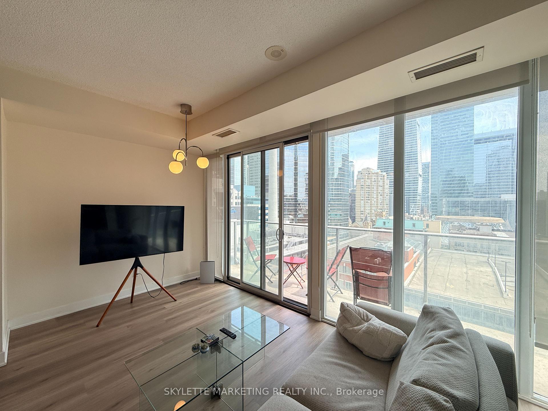 Photo 1 of Unit 1203, 126 Simcoe Street, Toronto, Waterfront Communities — HOMEH