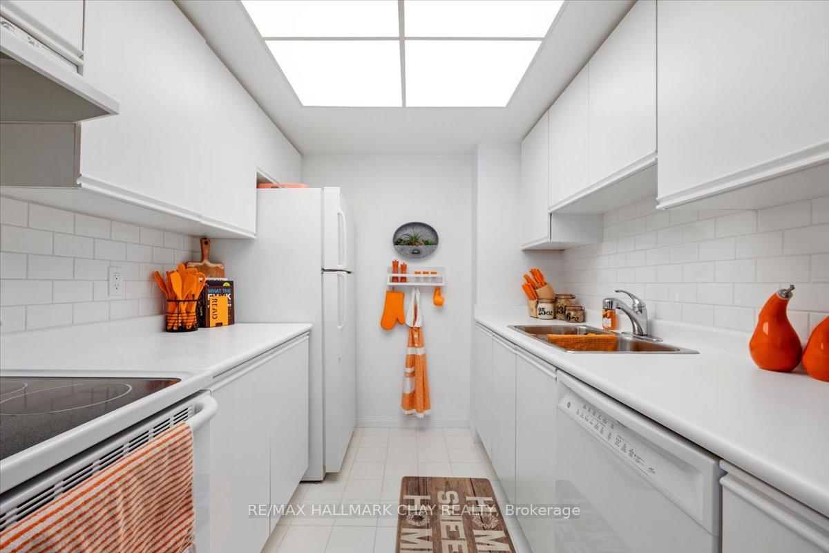 Photo 13 of Unit 602, 65 Ellen Street, Barrie, Lakeshore — HOMEH