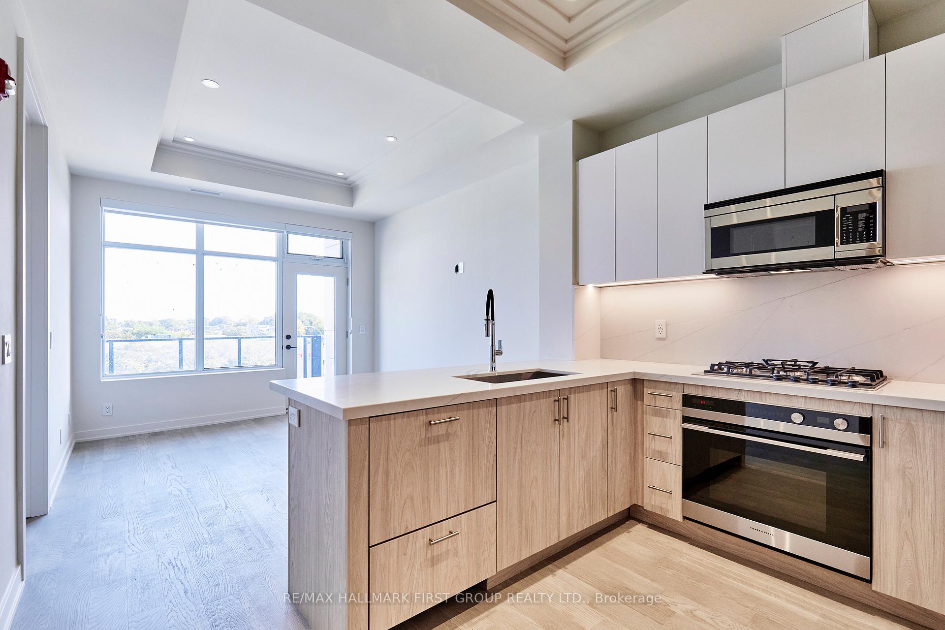 Photo 6 of Unit 407, 123 Maurice Drive, Oakville, Central — HOMEH