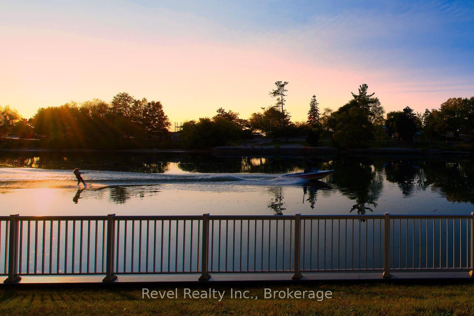 Photo 2 of Unit 4, 4-64 RIVER RD EAST River Road E, Wasaga Beach — HOMEH