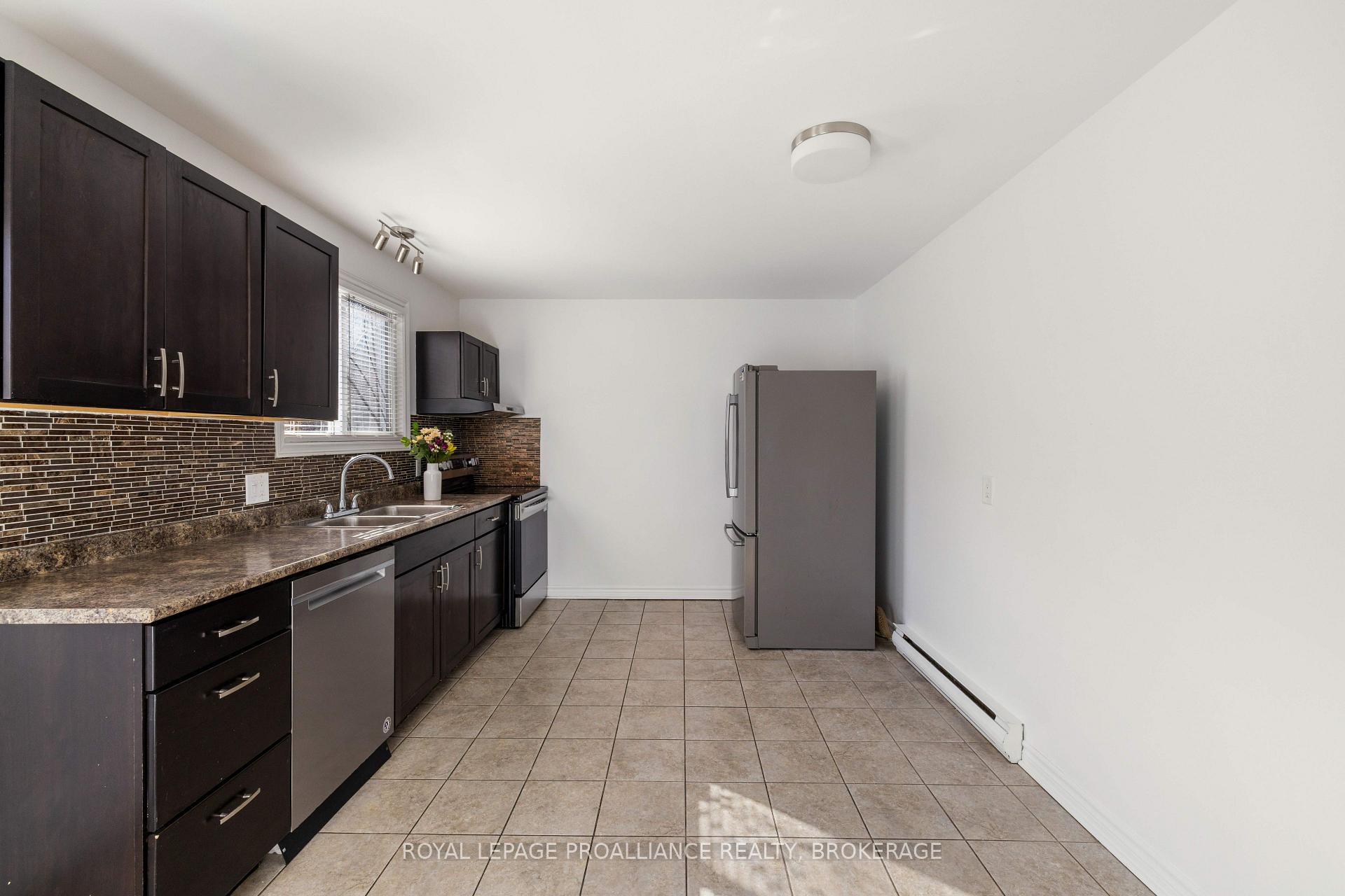 Photo 43 of Unit 53, 44 Rosemund Crescent, Kingston, West of Sir John A. Blvd — HOMEH