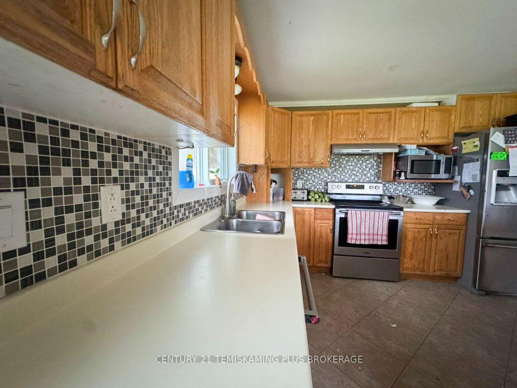 Photo 11 of 882881 65 Highway E, Timiskaming, TIM - Outside - Rural — HOMEH