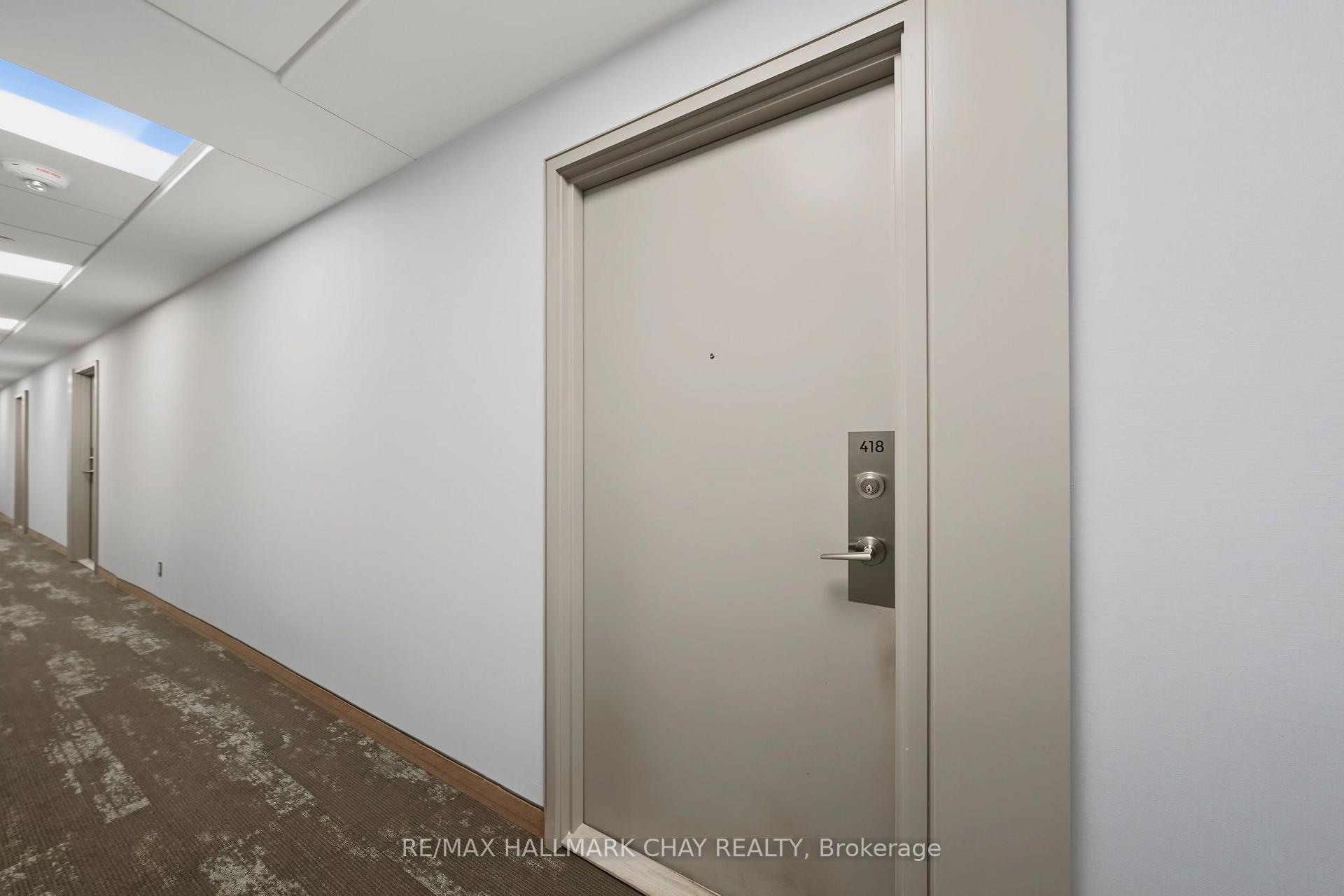 Photo 5 of Unit 418, 681 Yonge Street, Barrie, Painswick South — HOMEH