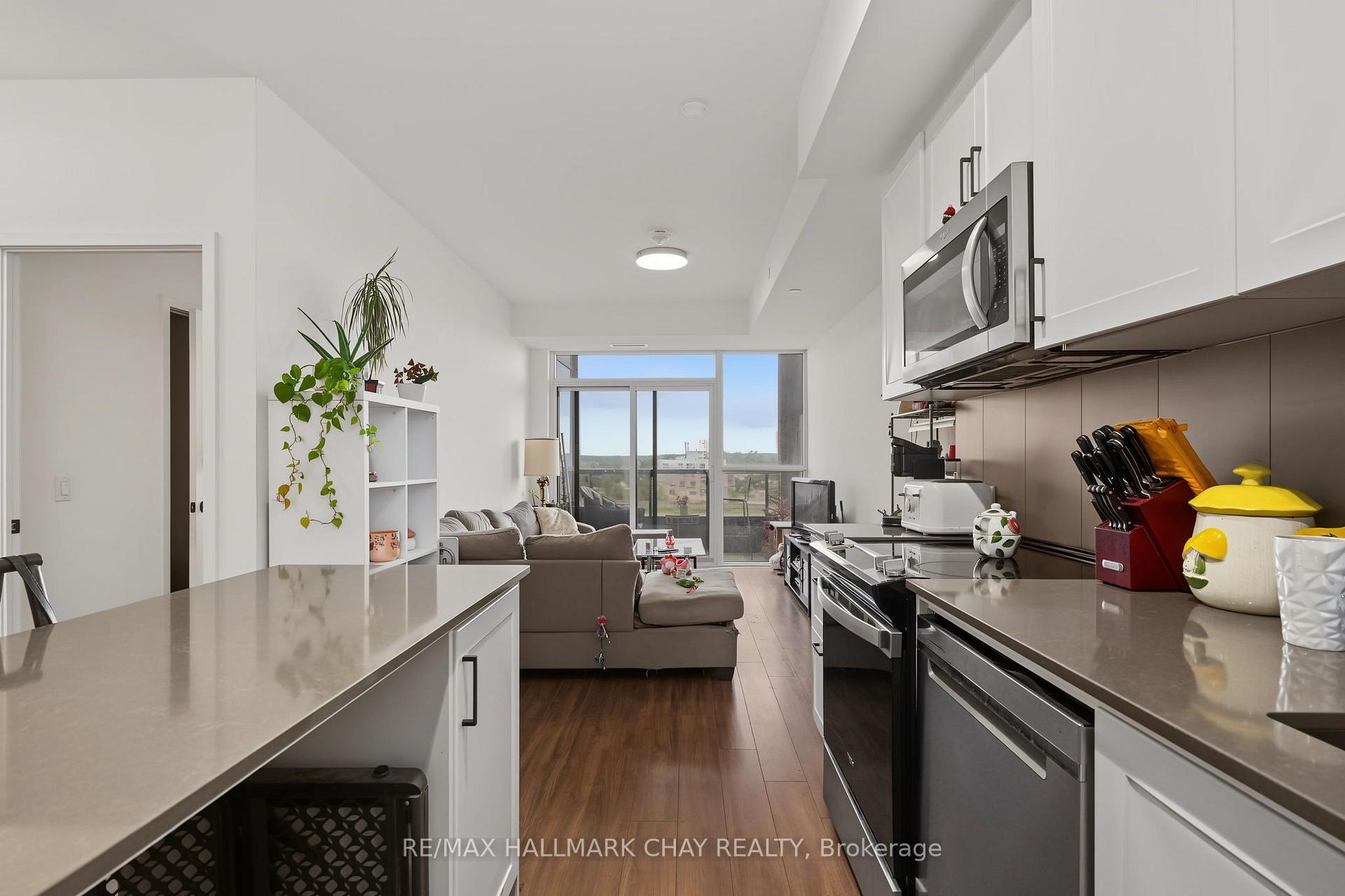 Photo 10 of Unit 418, 681 Yonge Street, Barrie, Painswick South — HOMEH