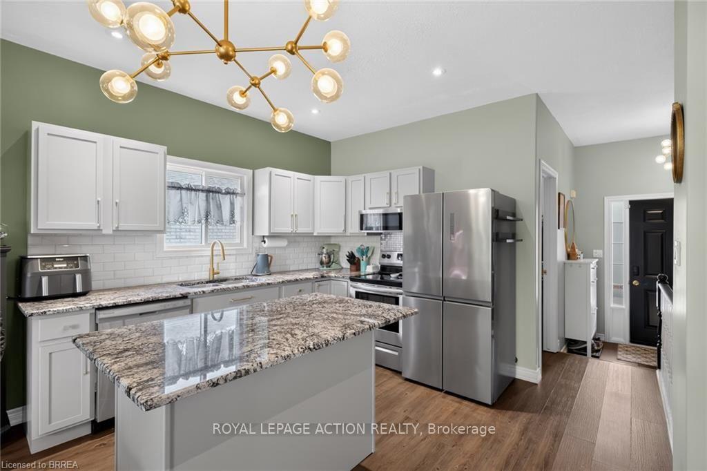 Photo 10 of Unit 11, 219 Shellard Lane, Brantford, Empire South — HOMEH