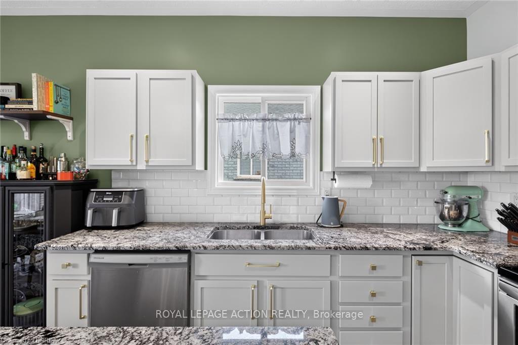 Photo 11 of Unit 11, 219 Shellard Lane, Brantford, Empire South — HOMEH