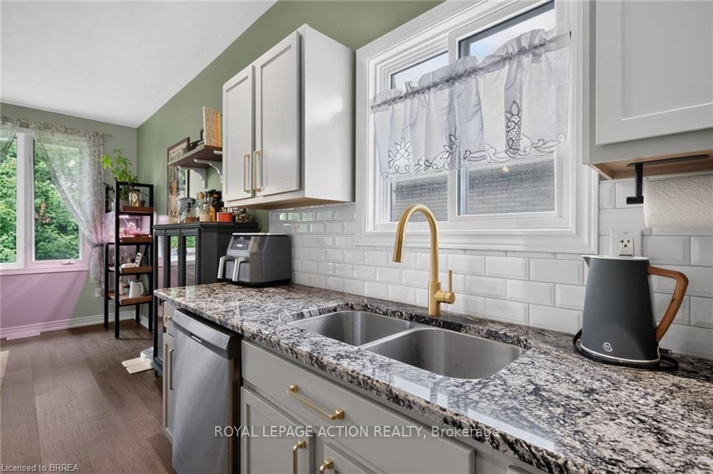 Photo 12 of Unit 11, 219 Shellard Lane, Brantford, Empire South — HOMEH