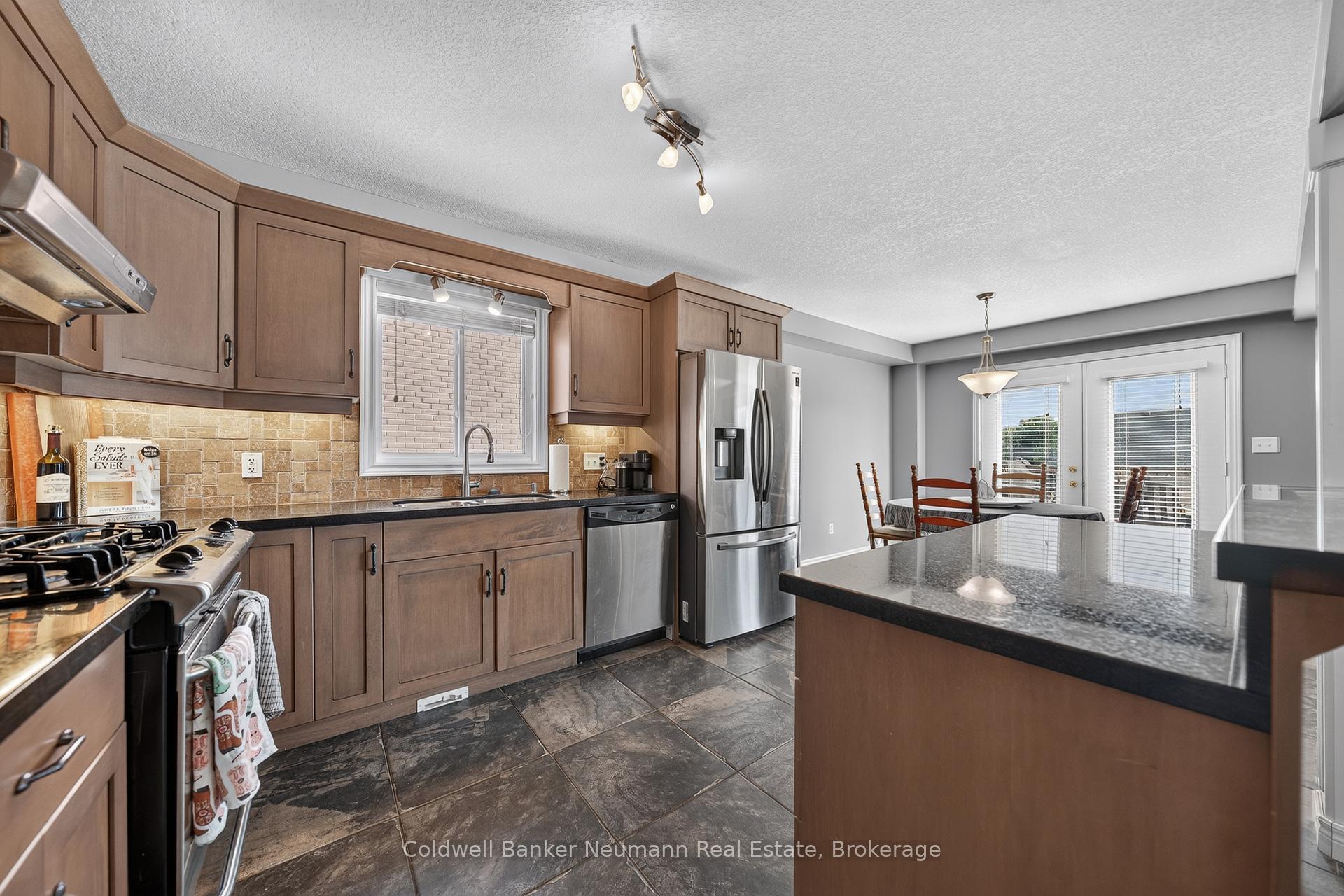 Photo 10 of 58 Washburn Drive, Guelph, Grange Road — HOMEH