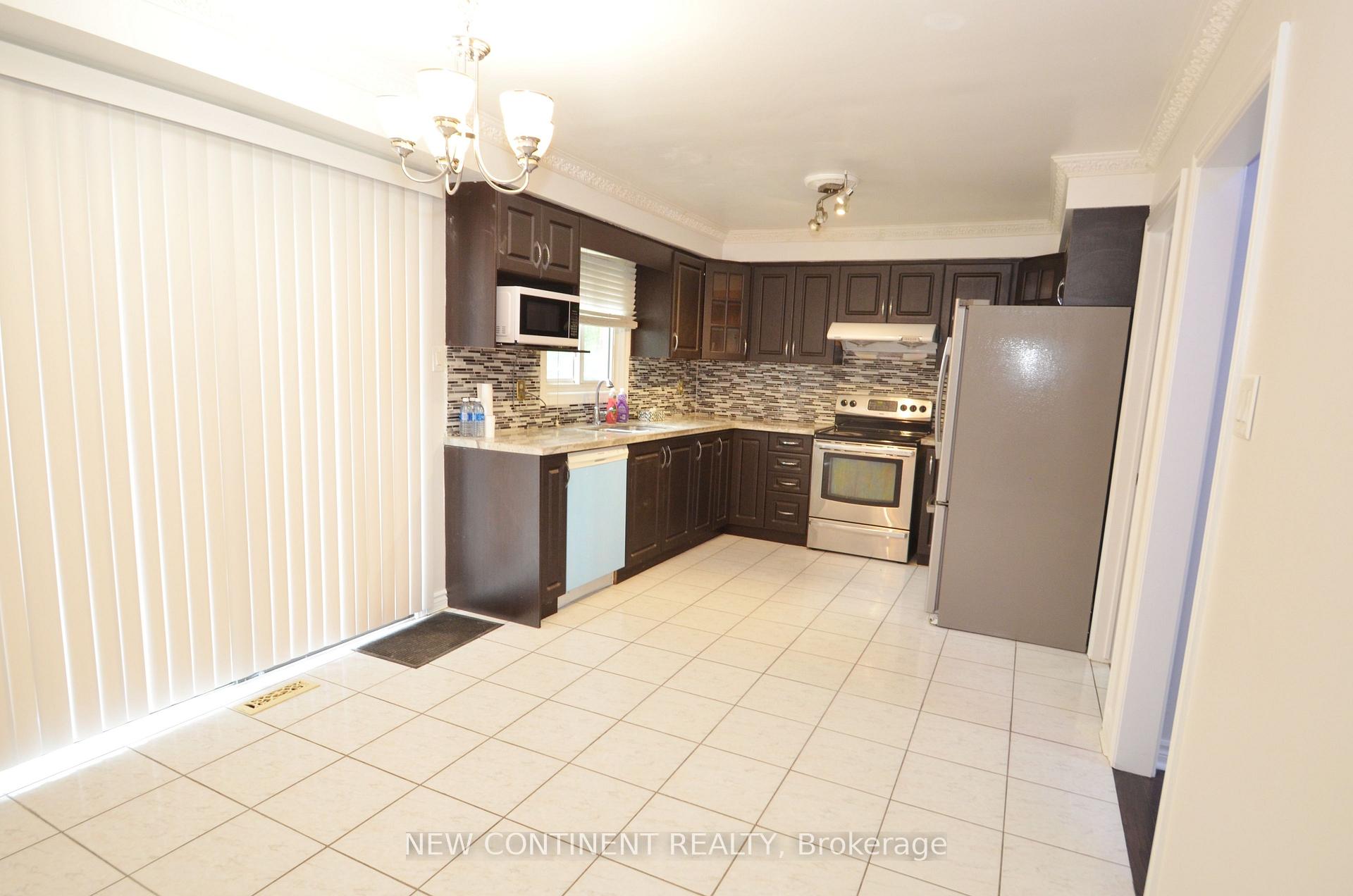 Photo 5 of Unit Main & 2nd, 67 Cornell Crescent, Markham, Milliken Mills East — HOMEH